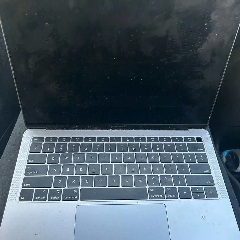 Mac book, will cost $450 to fix do to minor damage but still useable.